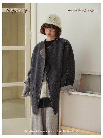 △ダブルフェイスウールで暖か ハンドステッチがポイントに。ドロップショルダーゆったり  ノーカラーコート△