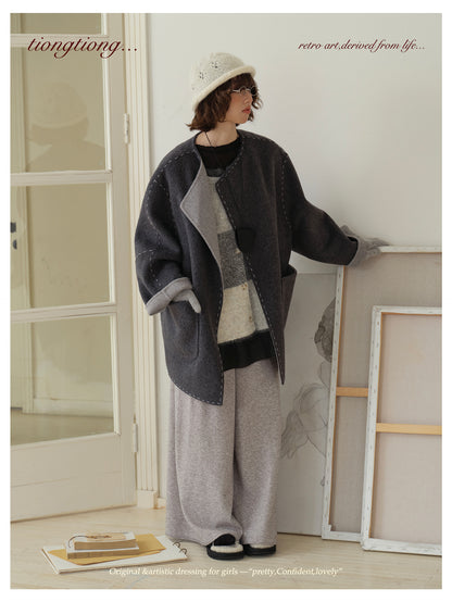 △ダブルフェイスウールで暖か ハンドステッチがポイントに。ドロップショルダーゆったり  ノーカラーコート△