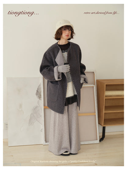 △ダブルフェイスウールで暖か ハンドステッチがポイントに。ドロップショルダーゆったり  ノーカラーコート△