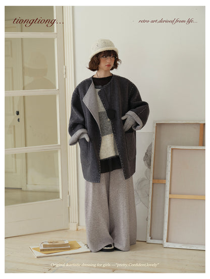 △ダブルフェイスウールで暖か ハンドステッチがポイントに。ドロップショルダーゆったり  ノーカラーコート△