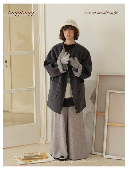 △ダブルフェイスウールで暖か ハンドステッチがポイントに。ドロップショルダーゆったり  ノーカラーコート△